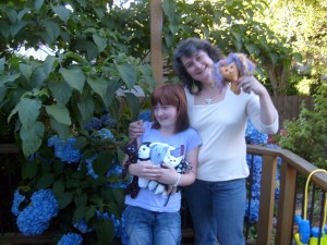 Joy & Maggie play dolls